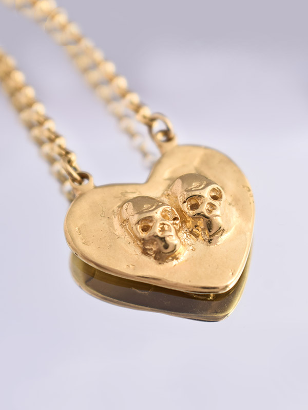 Skulls heart necklace