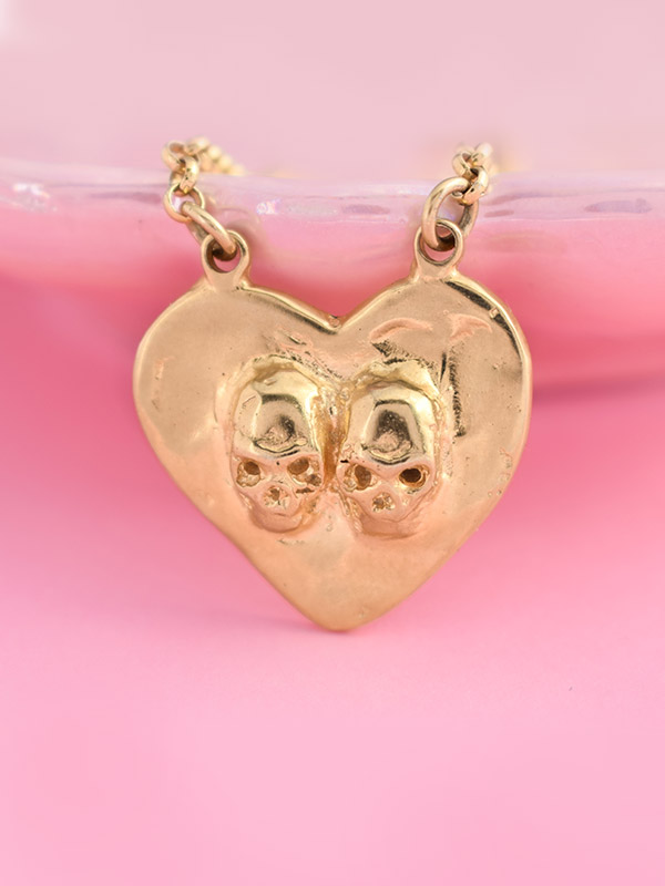 Skulls heart necklace
