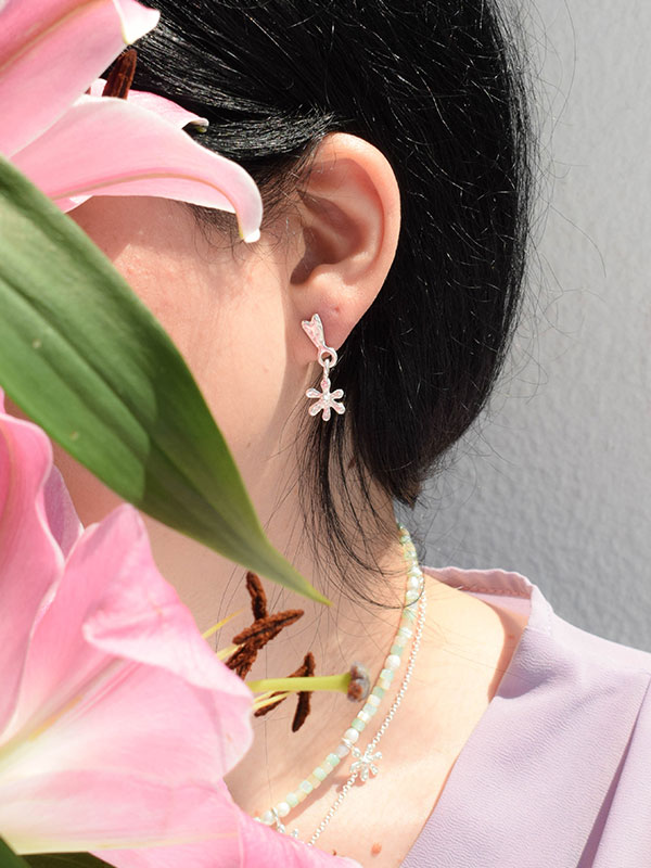 Heart and daisy stud earrings