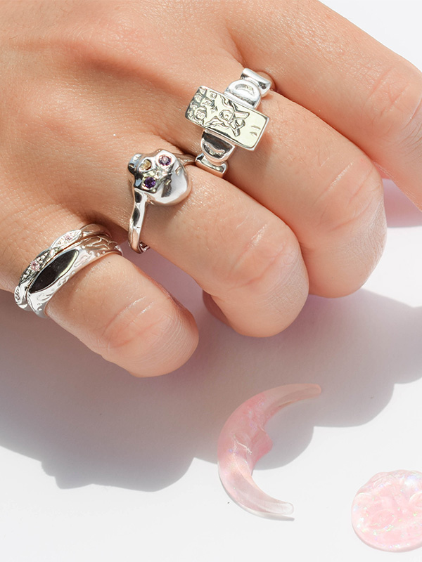 Thin silver ring with pink cz crystals