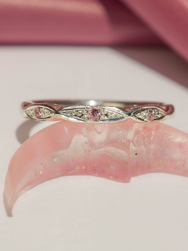 Thin silver ring with pink cz crystals