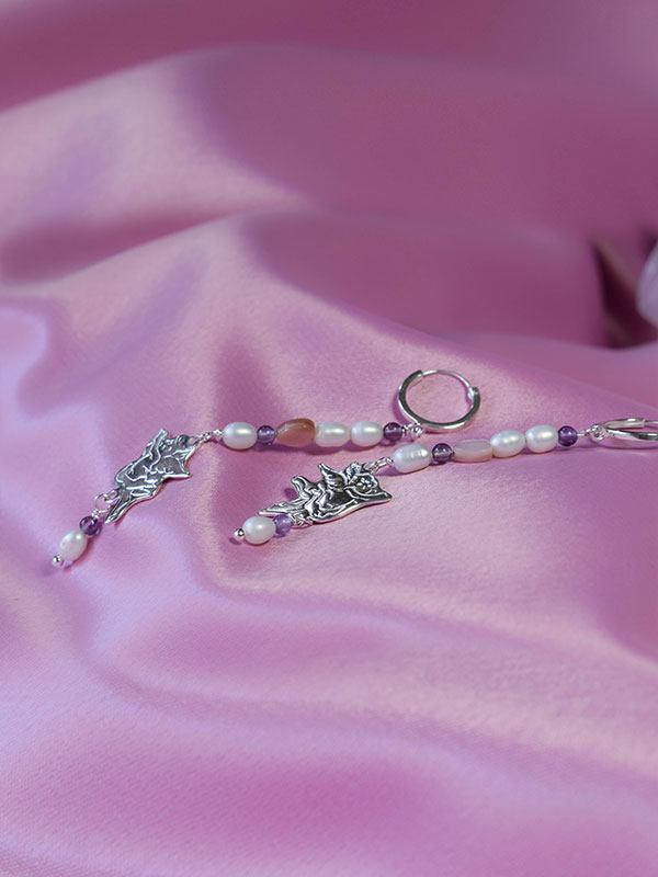 Long drop earrings with beads