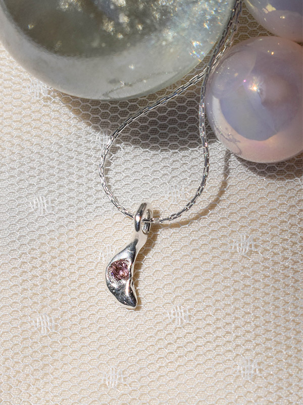 Tiny moon necklace with pink cubic zirconia